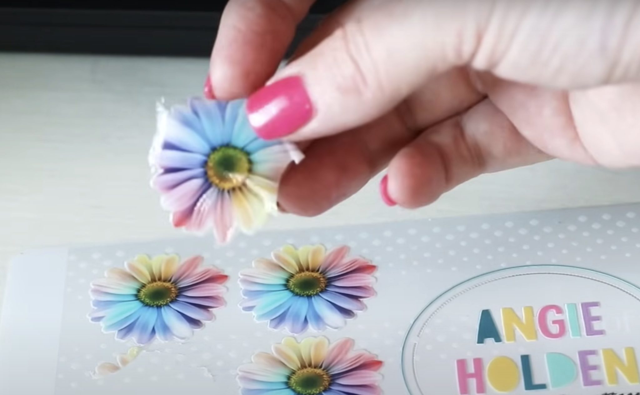 Close up of sticker before it's run through the laminating module.