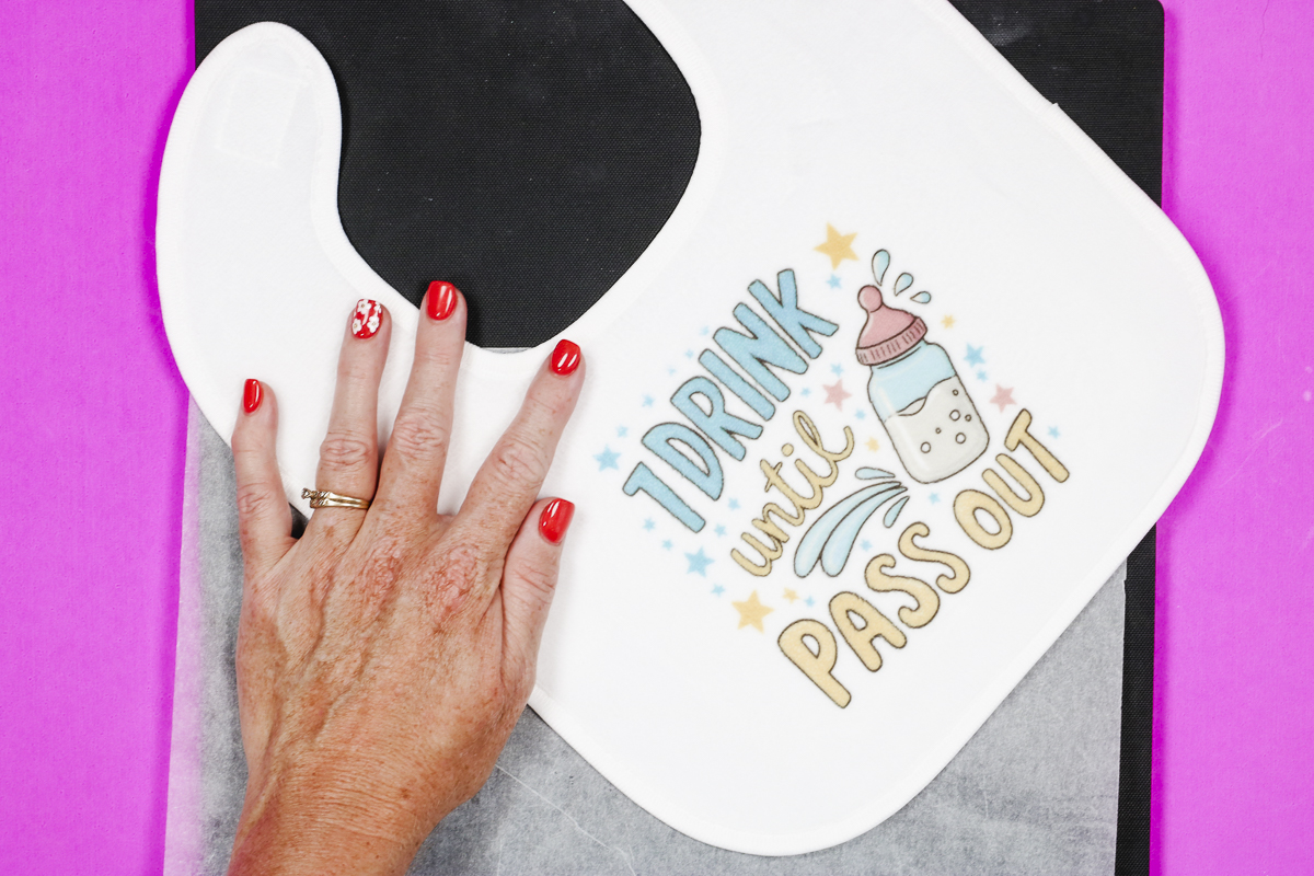 Design smoothed on baby bib.