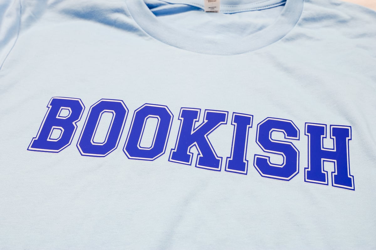 Super Pop on blue t-shirt.