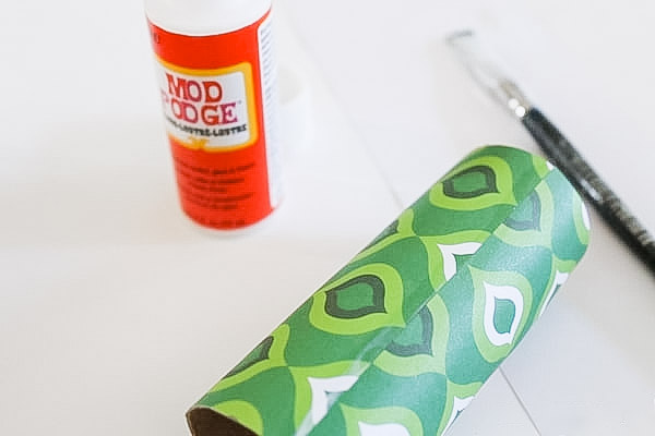 Adding mod poge to the seam of the scrapbaook paper