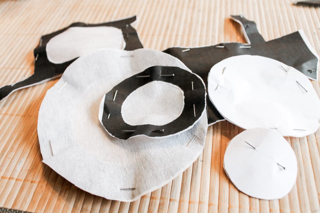 pinned pieces of cut interfacing for tractor applique