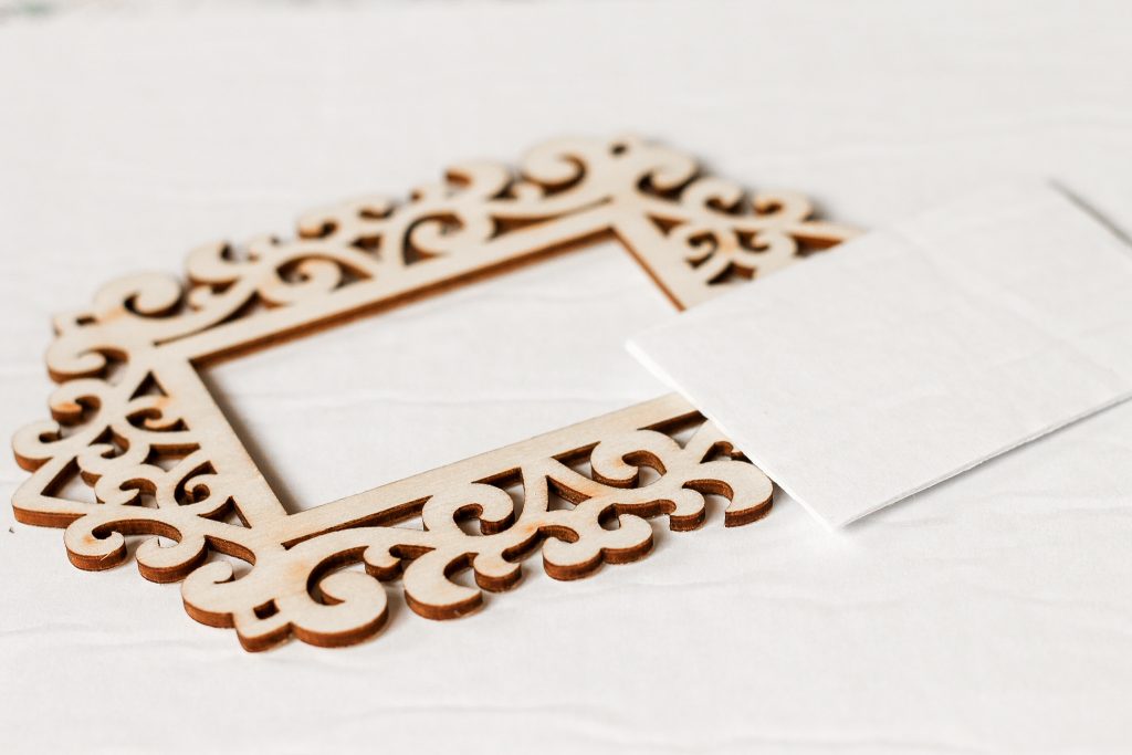 Cutting fabric phoomph to fit the frame
