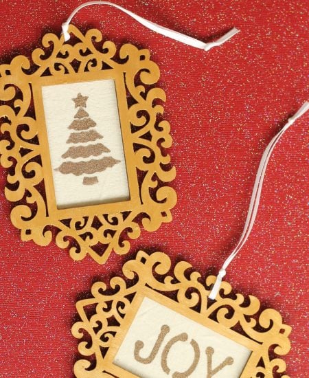 Wood frames with gold accents and stenciled fabric ornaments