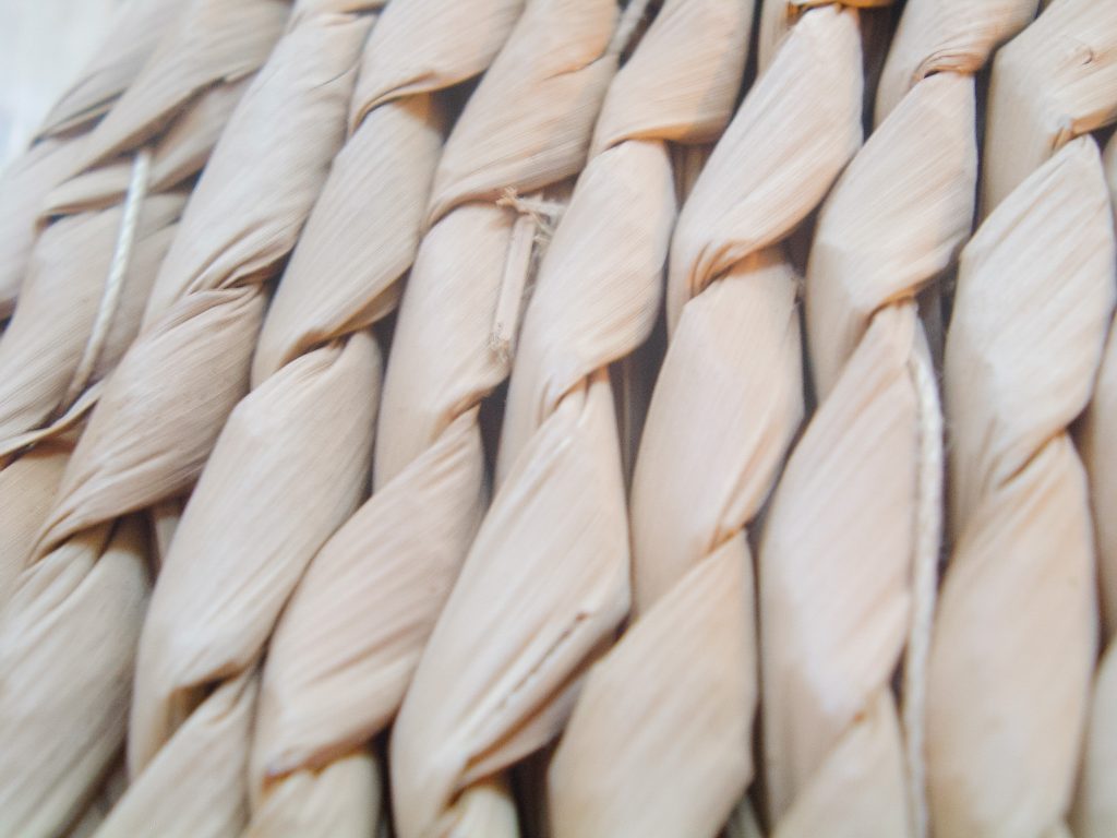 close up photo of braided seagrass