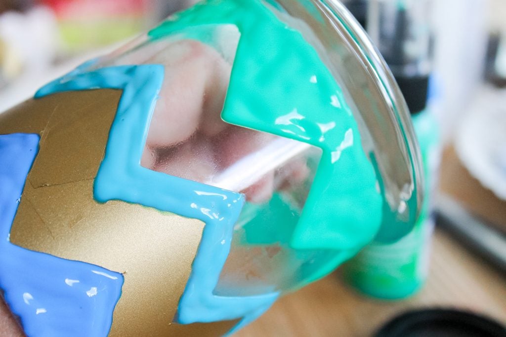Adding glass paint to the candle holder