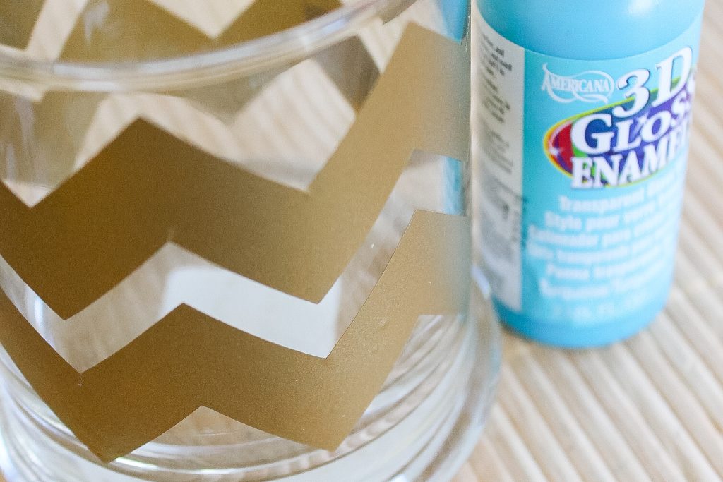 Adding cheveron cut vinyl to candle holder