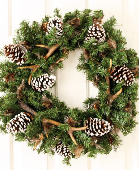 Antlers and pinecones on a wreath