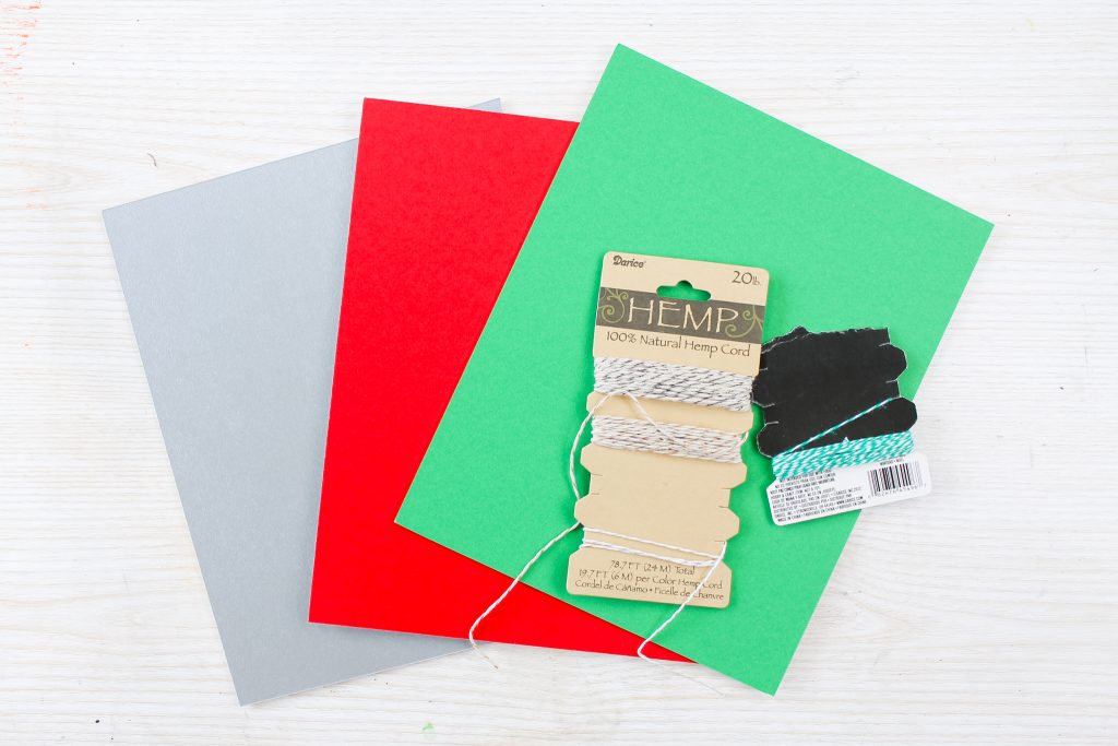 Supplies to make frame ornaments including mat board