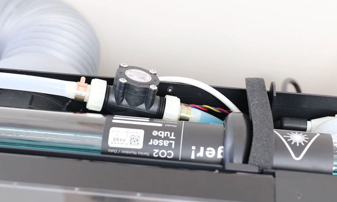 Open the back of the laser to fill the tank.