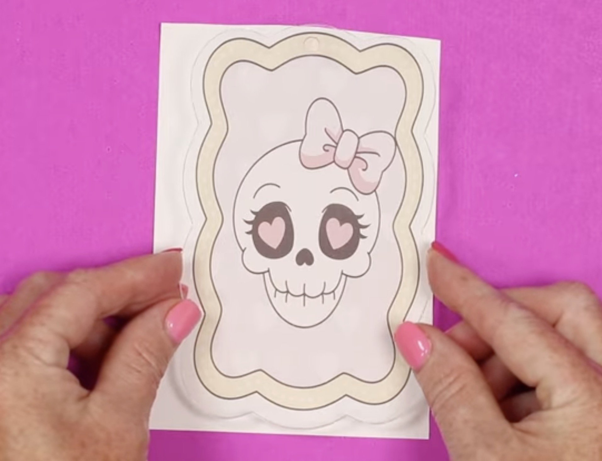 Locate design on adhesive sprayed print.