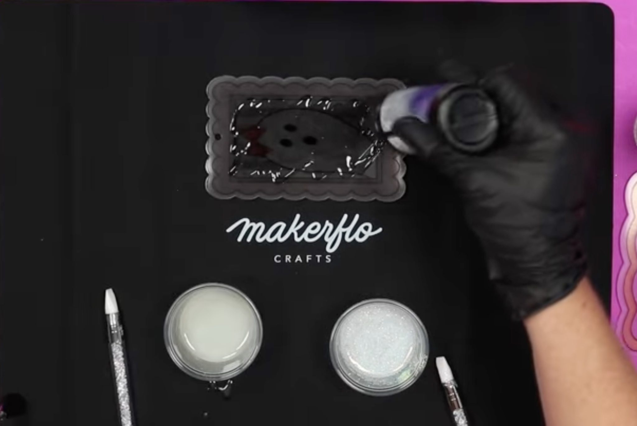 Add UV resin to the back of the acrylic bookmark.