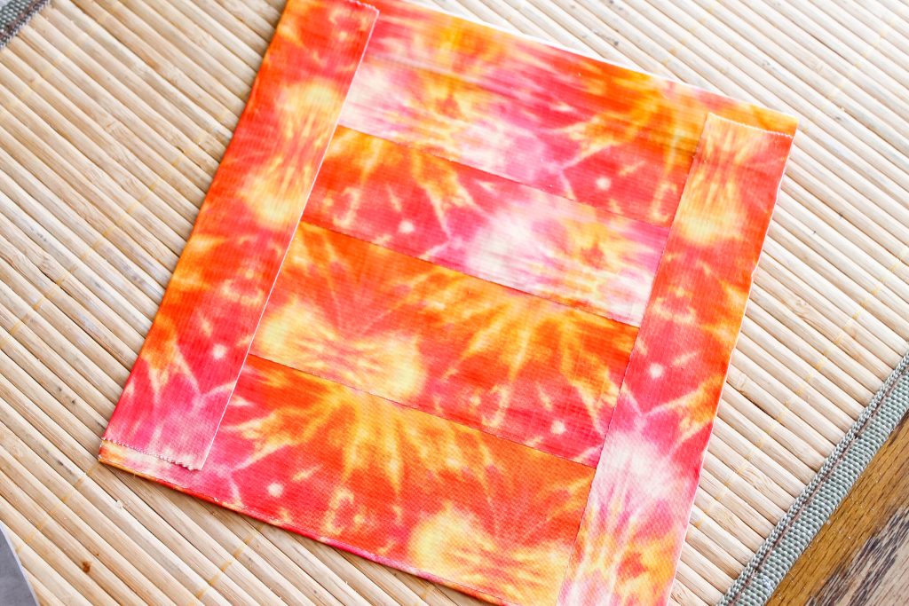 Duck tape adhered to plastic bag