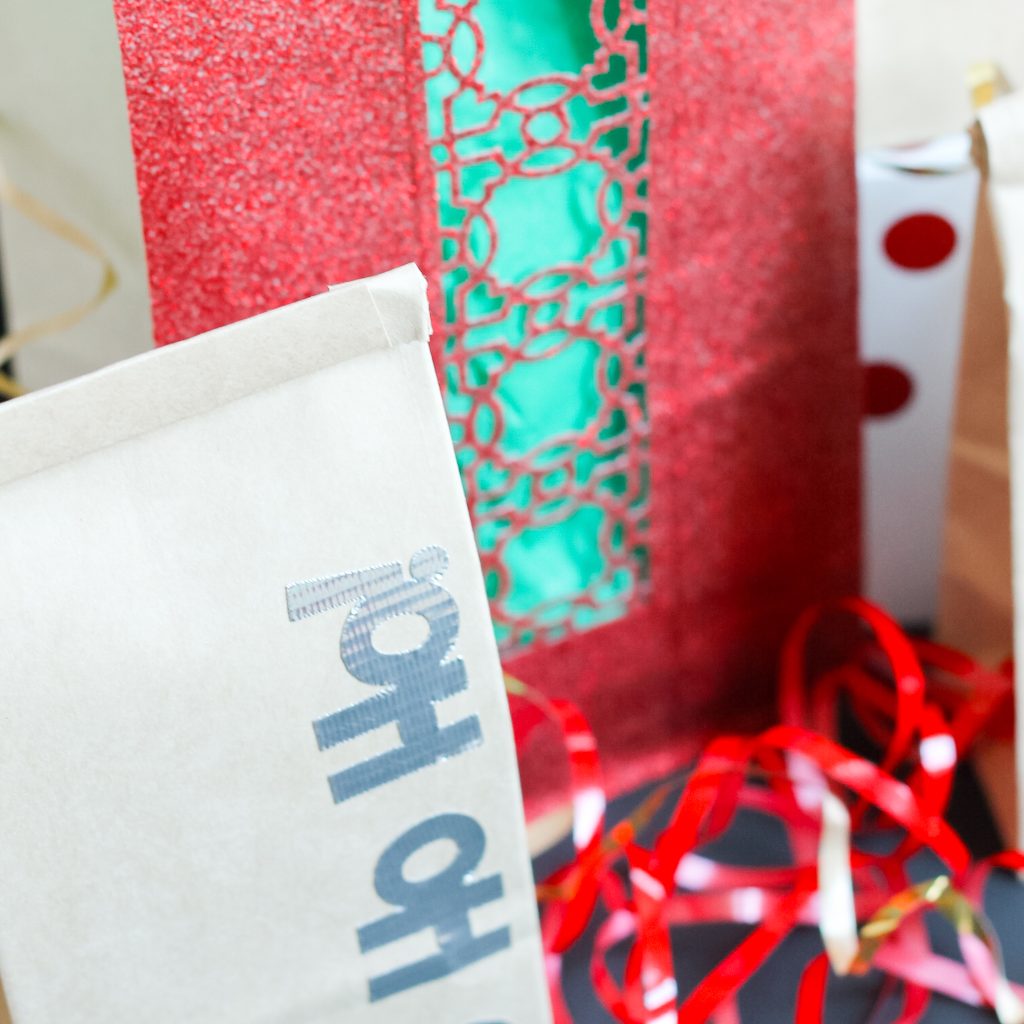 Red glitter added to paper bag