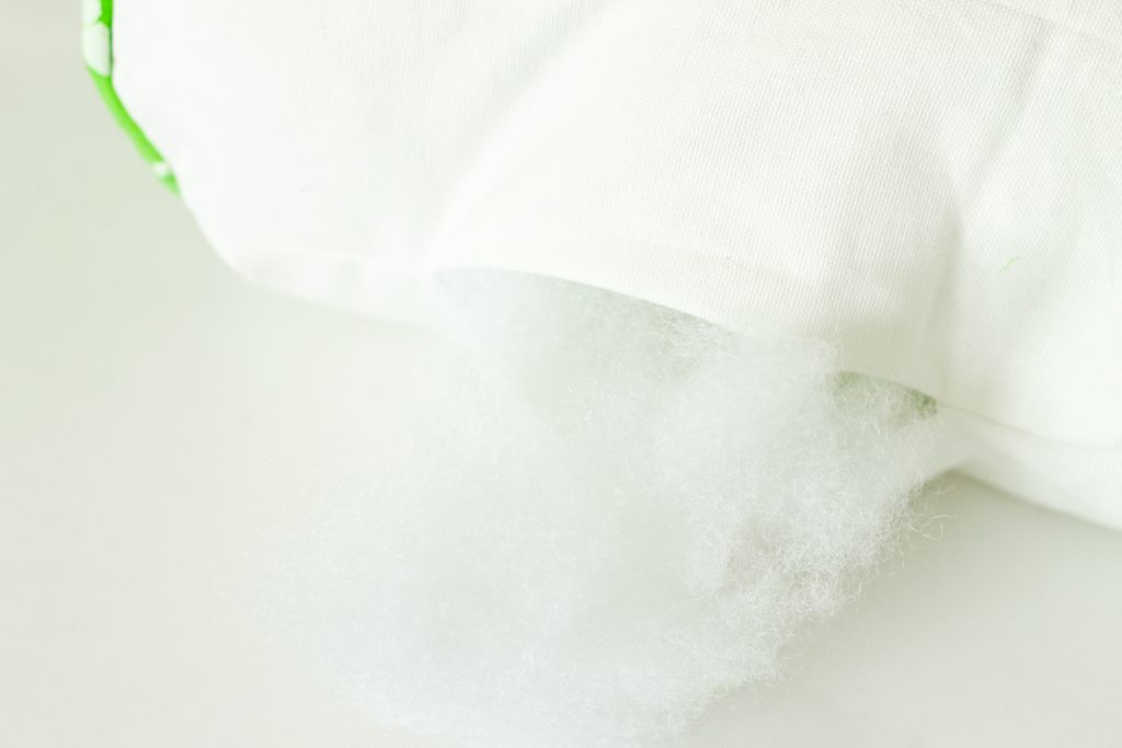 Adding stuffing to pillow form