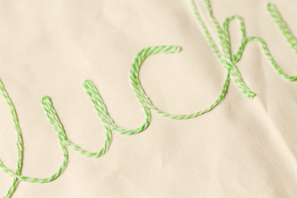 Glued twine on fabric