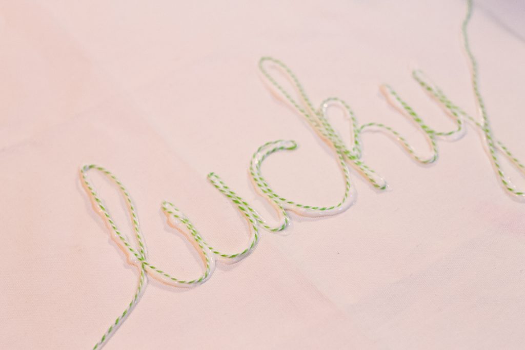 Bakers twine on glue to make embellishment