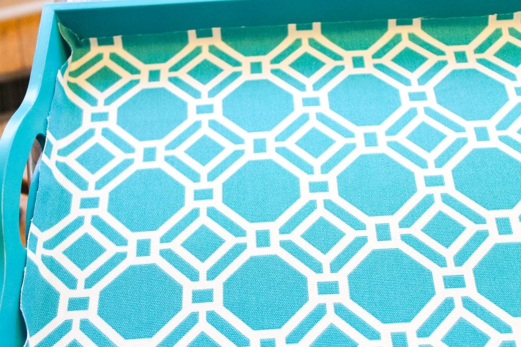 Fabric on a painted wooden tray