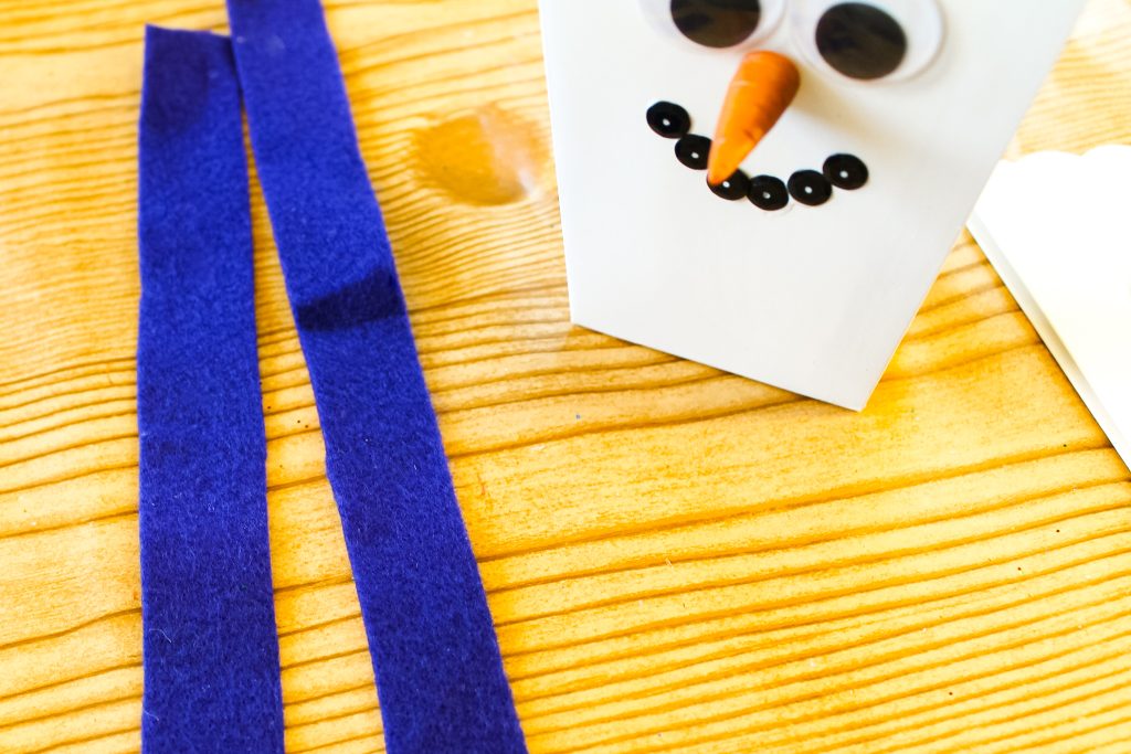 Cut felt strips for scarf