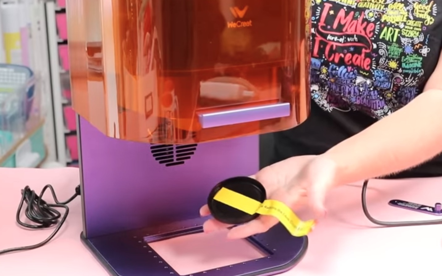 Remove cap from WeCreat Lumos laser head.