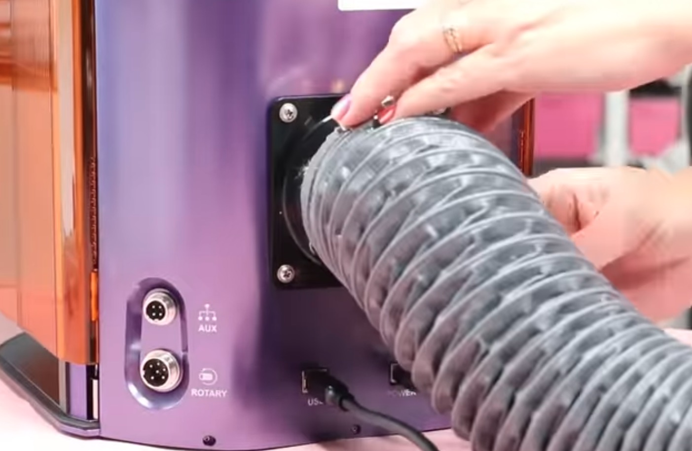 Attach vent hose to the back of the laser.