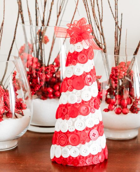 Red and white buttons on a foam cone to look like a tree