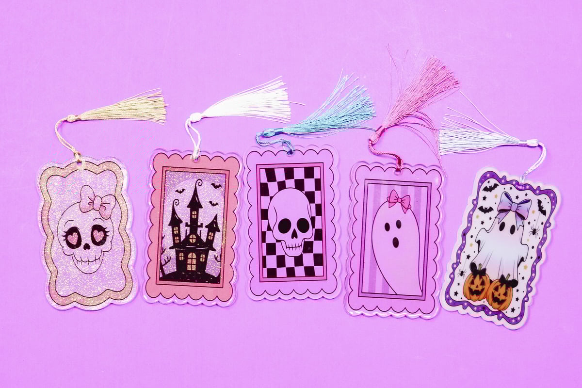 Cut and sublimate clear acrylic bookmarks.