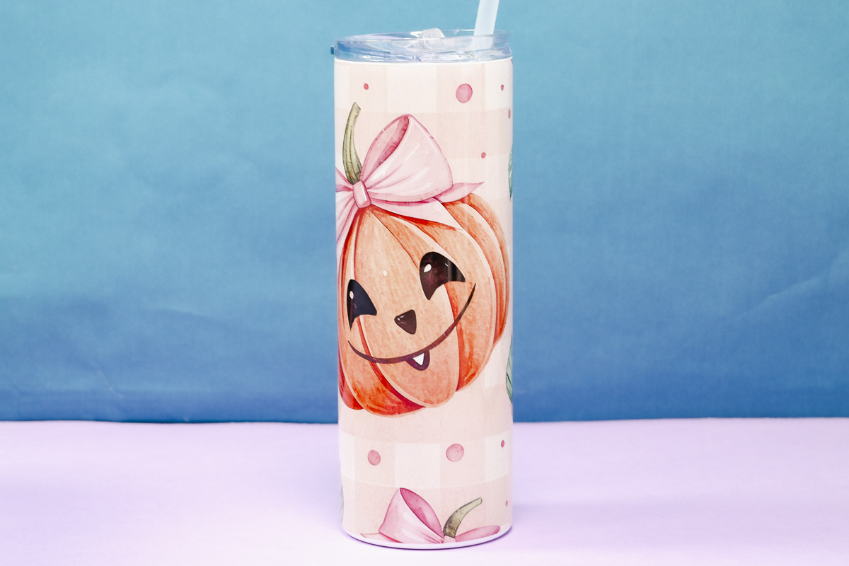 20-ounce tumbler with HTVRont Auto Tumbler press.