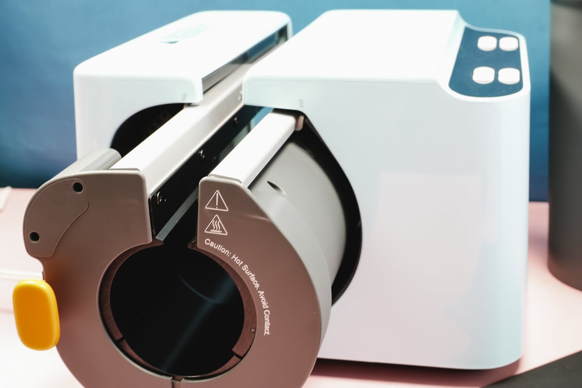 Slide the insert into the press.