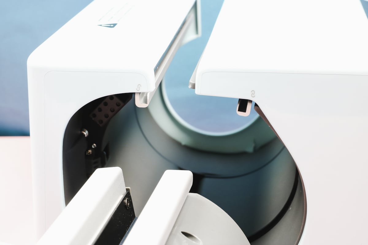 Line the insert up with the rails in the press.