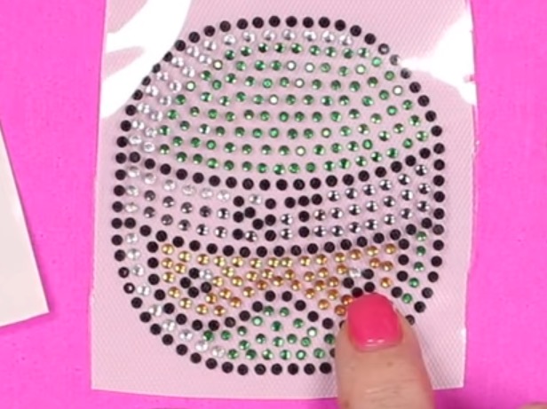 Rhinestone patch with multicolor rhinestones.