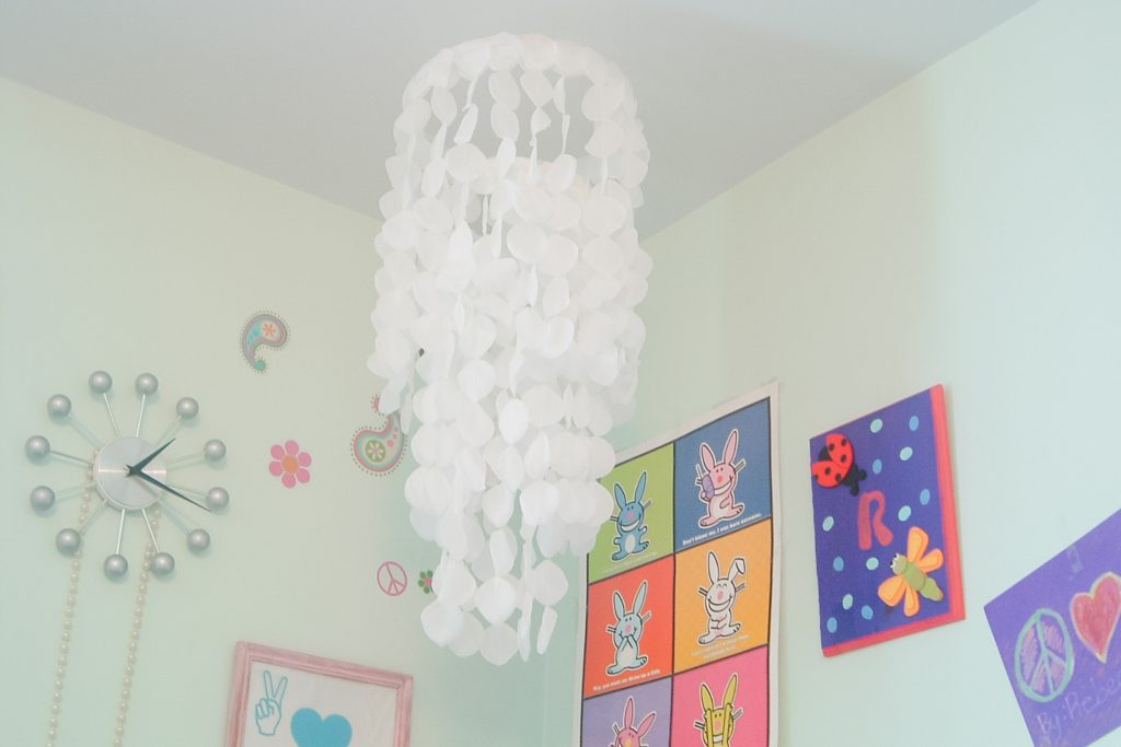 Gorgeous rose petals hanging from wooden hoops