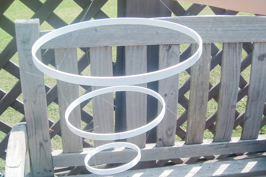 painted hoops with fishing line