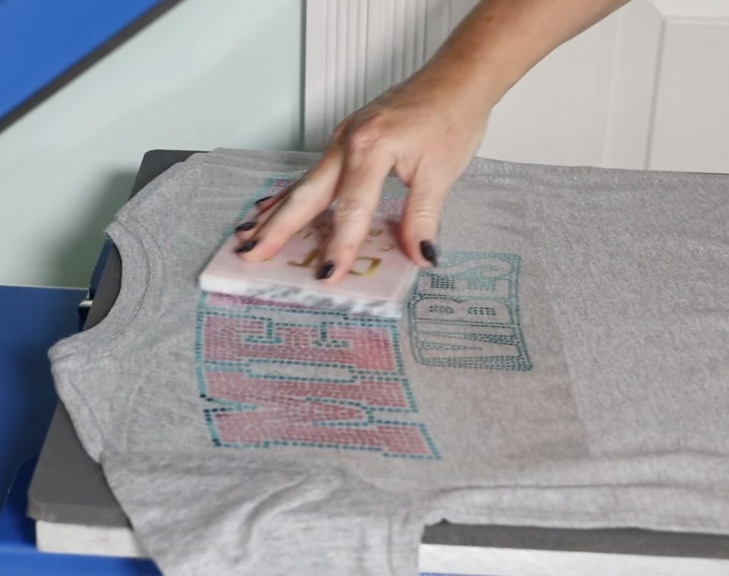 Locate DTF transfer on the back of the shirt.