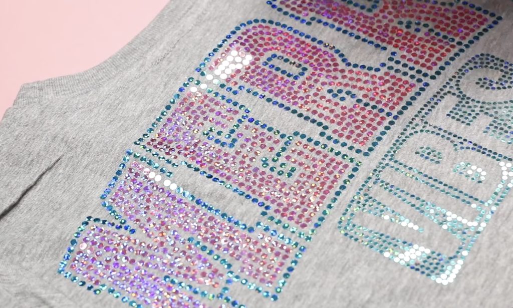 Close up of Spangle DTF on the back of a shirt.