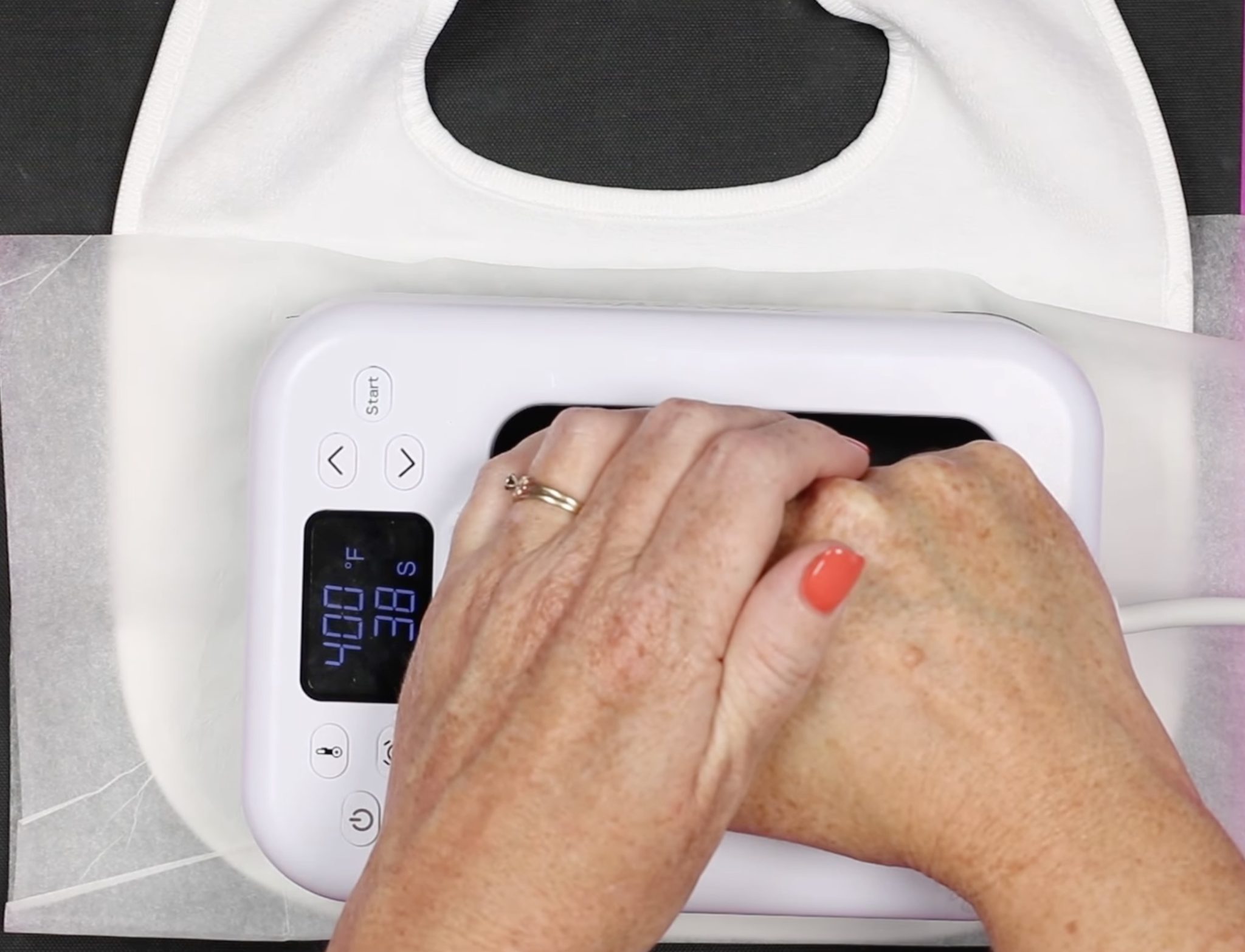 Press sublimation print onto bib.