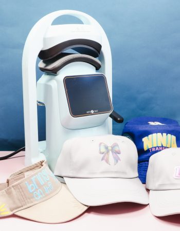 HTVRont auto hat press with finished hats.