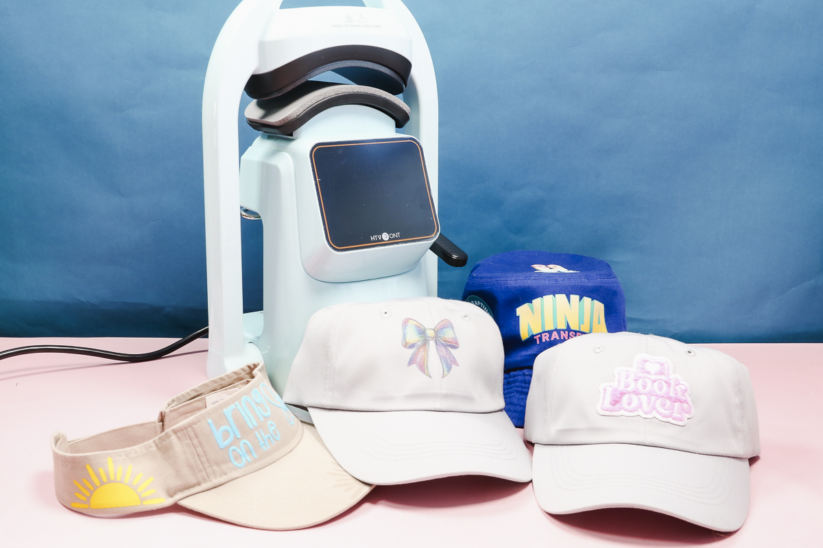 Finished hats with the HTVRont Auto Hat Press.