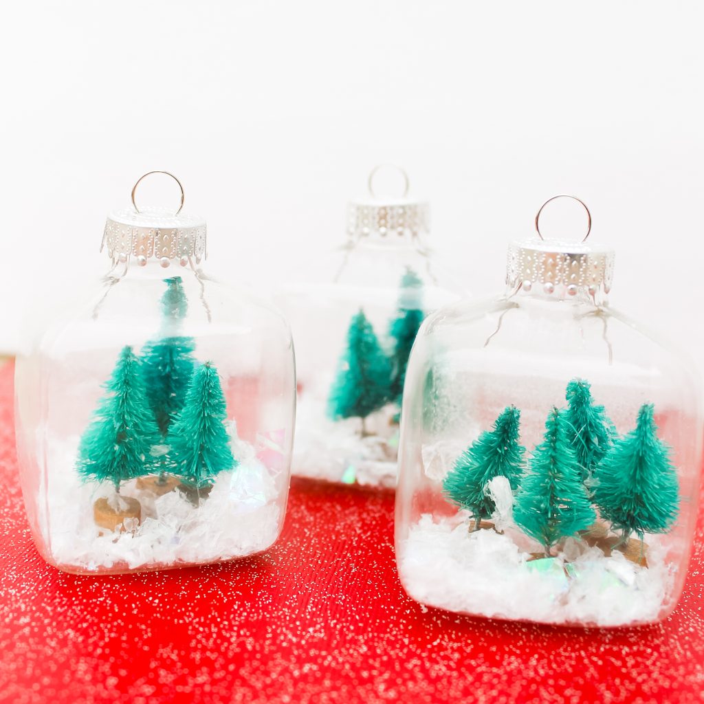 Kids Craft: Mini Snow Globe Ornaments -- click the picture to get the full instructions for making your own fun Christmas ornaments. Mini snow globe ornaments