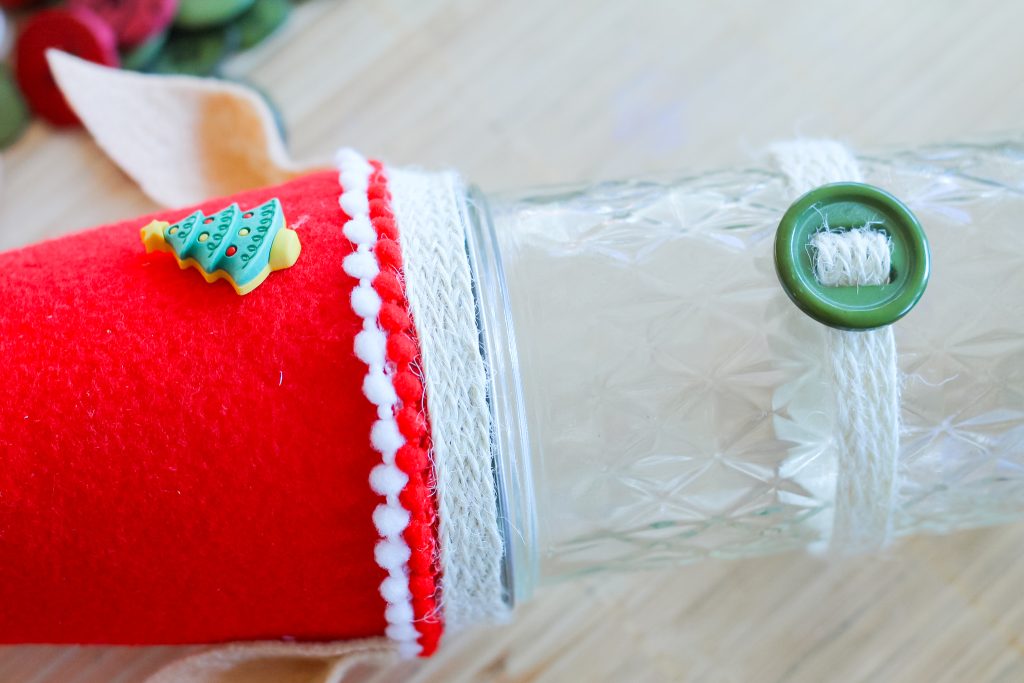 twine and button belt on jar