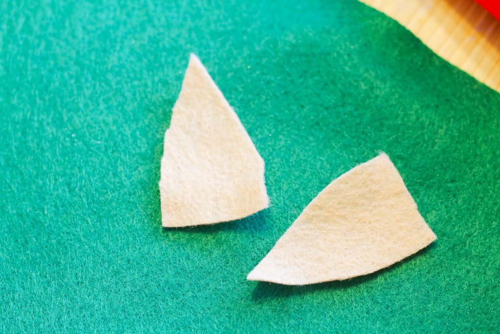 cut pieces of felt for elf ears