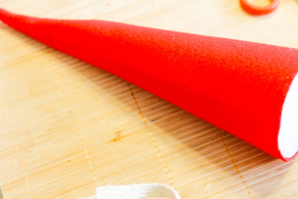 red felt wrapped around a foam cone shape