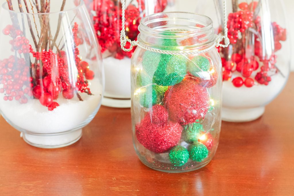 glitter foam balls and battery operated lights in a jar