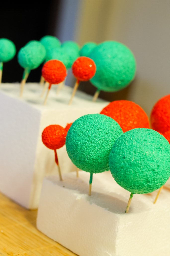 Painted foam balls on toothpicks