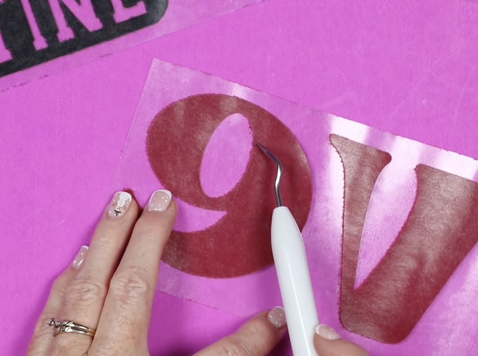 Use a weeding tool to remove insides of letters.