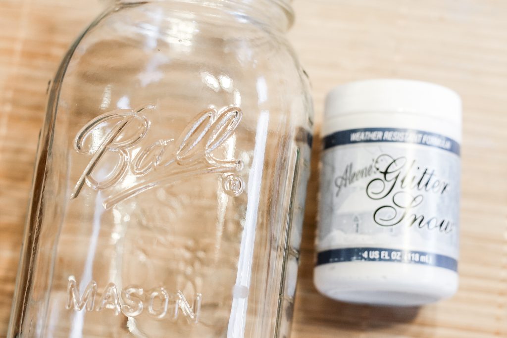 glass jar with glitter snow