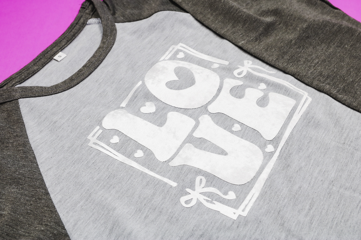 Finished Pearl White Lush HTV on child's shirt.