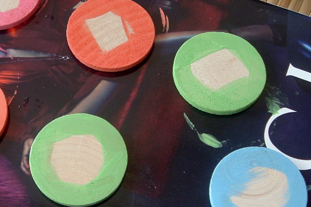 painted wooden discs