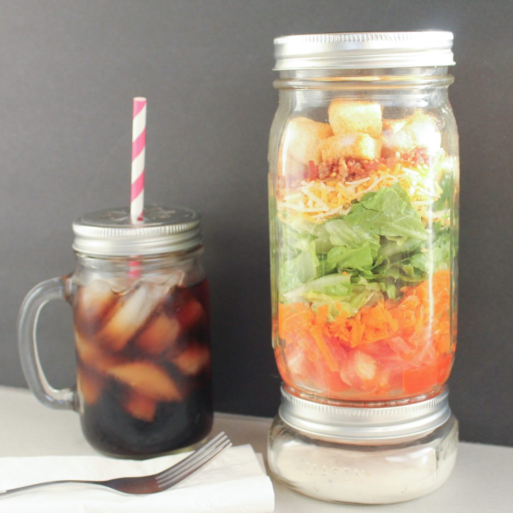 salad and drink in a jar