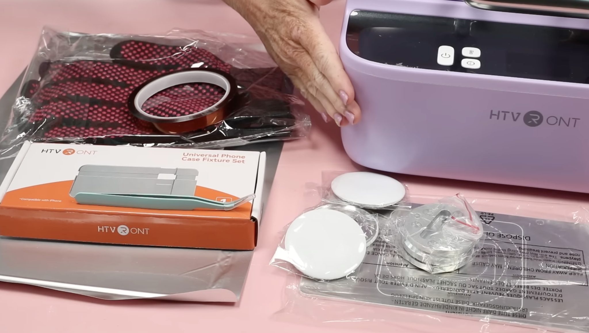 Supplies used to make a custom sublimation phone case.