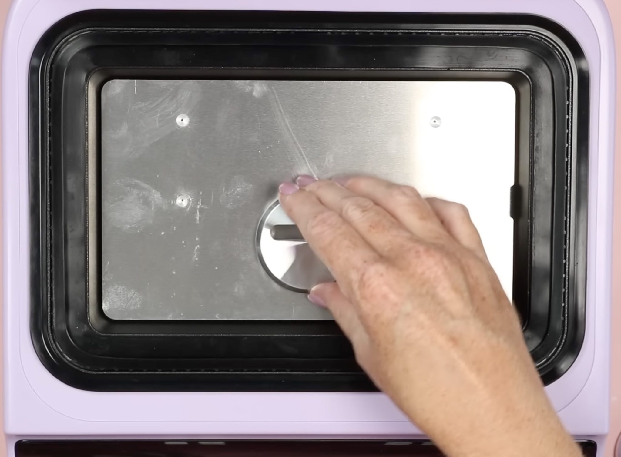 HTVRont Phone Case heat press fixture for buttons.